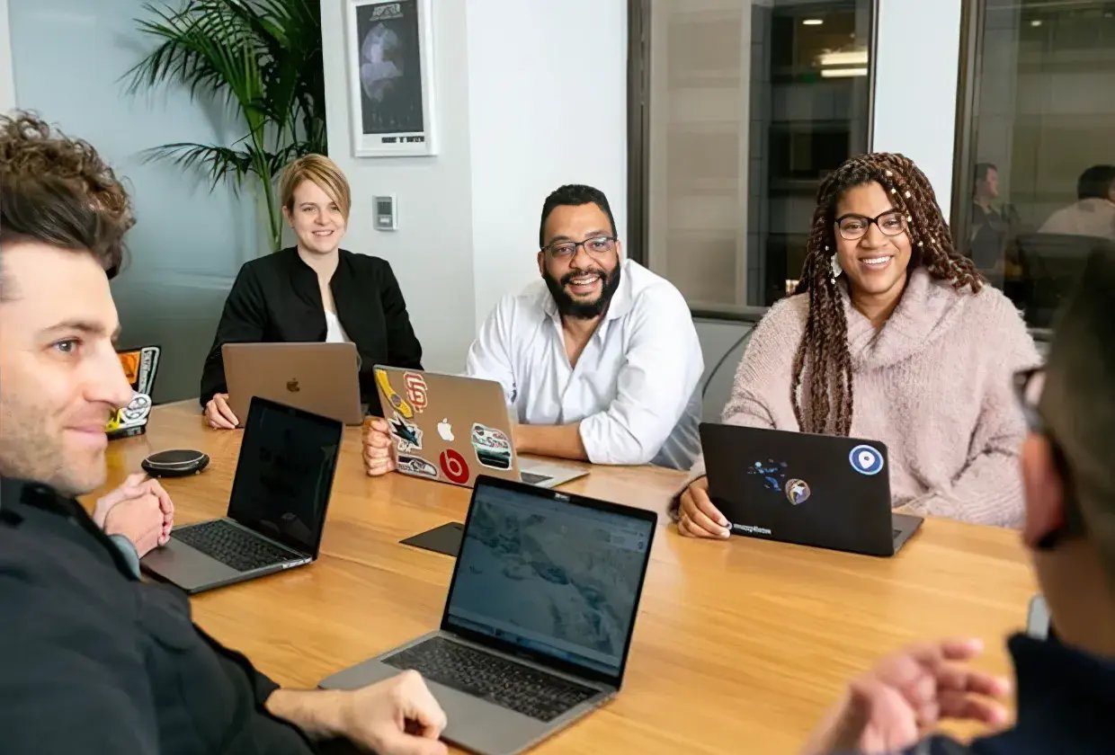 Arcos employees working in the office