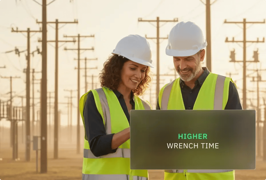 Two engineers in safety gear examine a laptop with "HIGHER WRENCH TIME" displayed at an electrical substation.