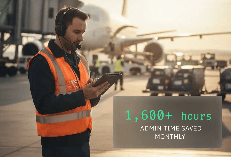 Man using tablet at airport, saving admin time.