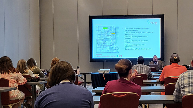 ARCOS staff conduct user training in a medium ballroom