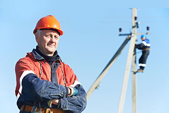 Lineman with crossed arms