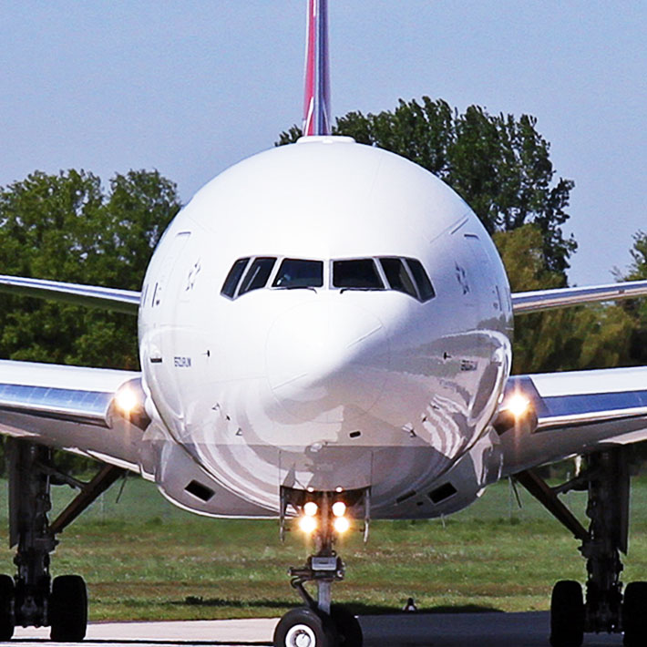 Front view of an airplane preparing for takeoff