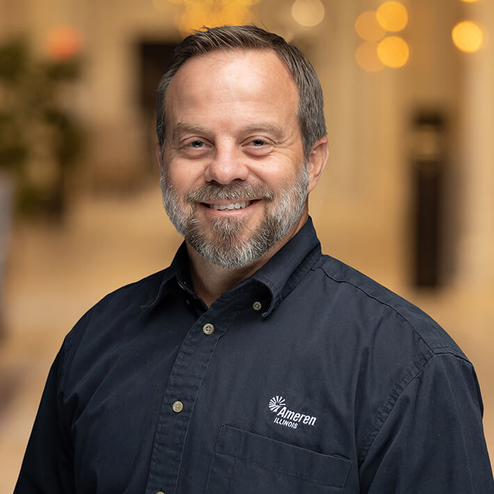 Headshot photograph of Adam Proctor