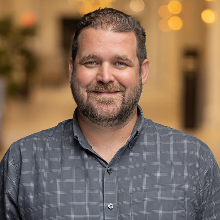 Headshot photograph of Zach DeLeon